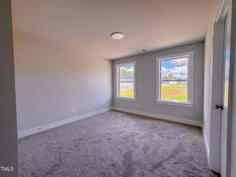 Bedroom - 8816 Melvin St #LOT 15, Willow Spring, NC 27592 photo 8 of 11