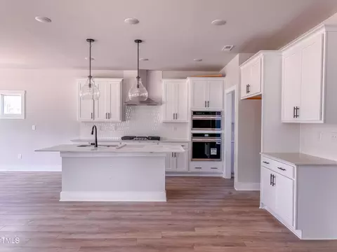 Kitchen - 8816 Melvin St #LOT 15, Willow Spring, NC 27592 photo 2 of 5