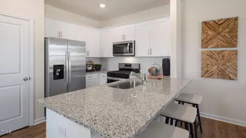 Kitchen - 477 Belgian Red Way, Wake Forest, NC 27587 photo 2 of 3