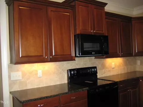 Kitchen - 166 Easy Wind Ln, Garner, NC 27529 photo 2 of 2