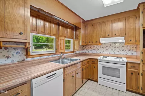 Kitchen - 135 Rainbow Dr, Dunn, NC 28334 photo 5 of 5