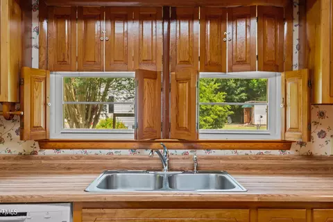 Kitchen - 135 Rainbow Dr, Dunn, NC 28334 photo 3 of 5