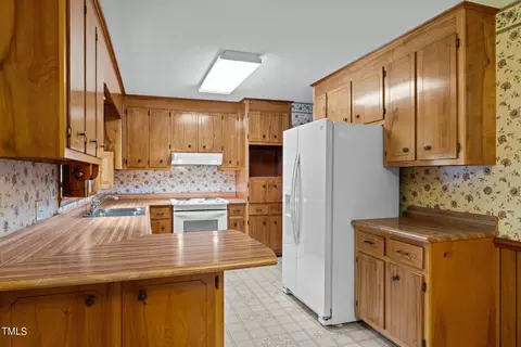Kitchen - 135 Rainbow Dr, Dunn, NC 28334 photo 2 of 5
