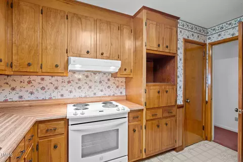Kitchen - 135 Rainbow Dr, Dunn, NC 28334 photo 4 of 5