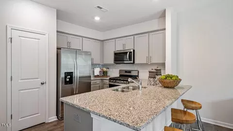Kitchen - 461 Belgian Red Way, Wake Forest, NC 27587 photo 3 of 4