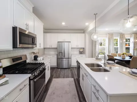 Kitchen - 233 Shingle Oak Rd, Wake Forest, NC 27587 photo 2 of 3