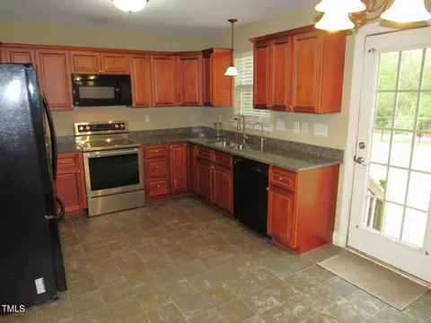 Kitchen - 126 Creedmoor Rd, Stem, NC 27581 photo 3 of 4
