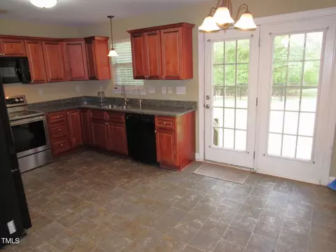 Kitchen - 126 Creedmoor Rd, Stem, NC 27581 photo 2 of 4