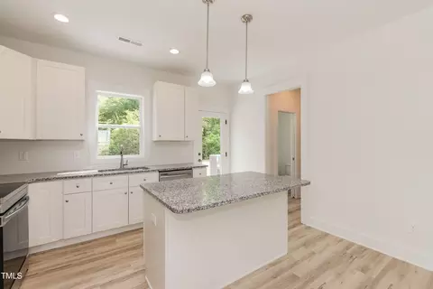 Kitchen - 1057 E 1059 E Harnett St, Dunn, NC 28334 photo 1 of 9