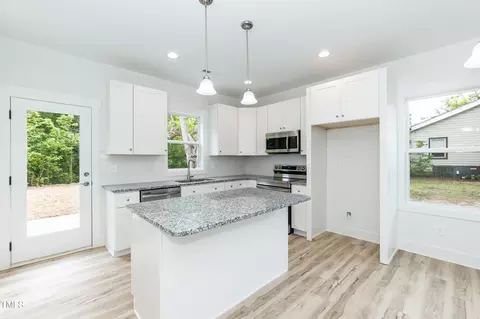 Kitchen - 1057 E 1059 E Harnett St, Dunn, NC 28334 photo 5 of 9