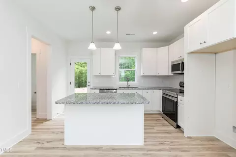 Kitchen - 1057 E 1059 E Harnett St, Dunn, NC 28334 photo 6 of 9