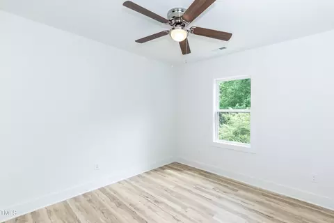 Bedroom - 1057 E 1059 E Harnett St, Dunn, NC 28334 photo 2 of 10