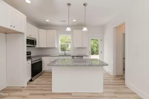 Kitchen - 1057 E 1059 E Harnett St, Dunn, NC 28334 photo 2 of 9