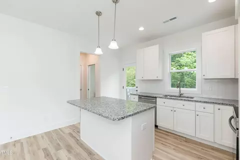 Kitchen - 1057 E 1059 E Harnett St, Dunn, NC 28334 photo 7 of 9