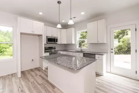 Kitchen - 1057 E 1059 E Harnett St, Dunn, NC 28334 photo 3 of 9
