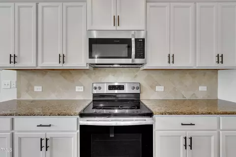 Kitchen - 384 Grey Hawk Dr, Garner, NC 27529 photo 6 of 7