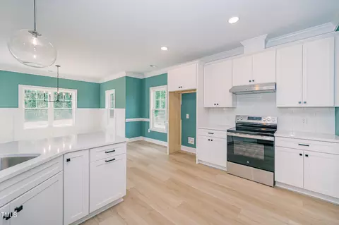 Kitchen - 219 Crescent Dr, Dunn, NC 28334 photo 1 of 2