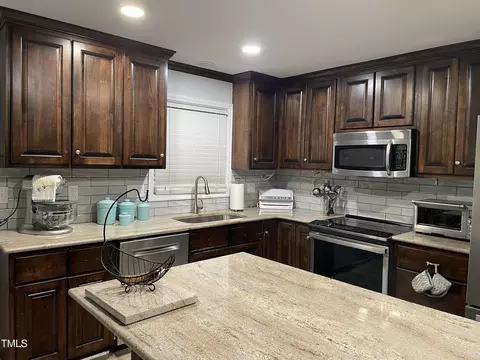 Kitchen - 305 Briarcliff Dr, Dunn, NC 28334 photo 2 of 3