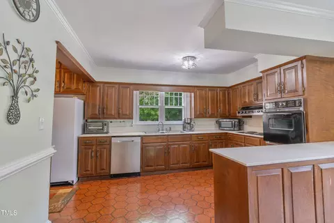 Kitchen - 219 E Nash St, Spring Hope, NC 27882 photo 2 of 3