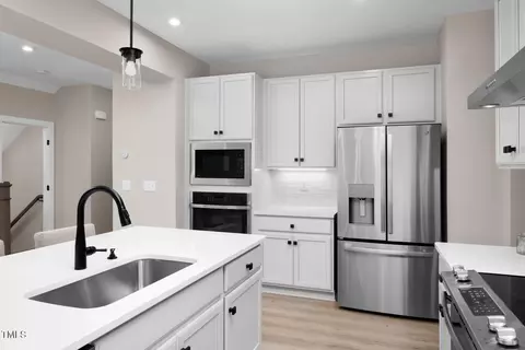 Kitchen - 820 Walker Ridge Way, Willow Spring, NC 27592 photo 4 of 7