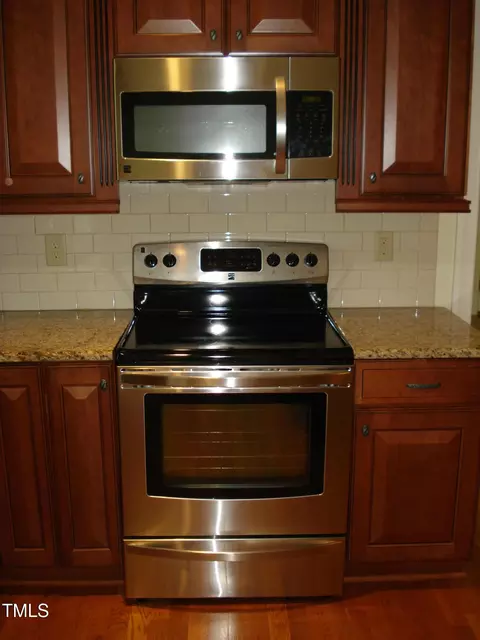 Kitchen - 117 Crescent Dr, Dunn, NC 28334 photo 7 of 8