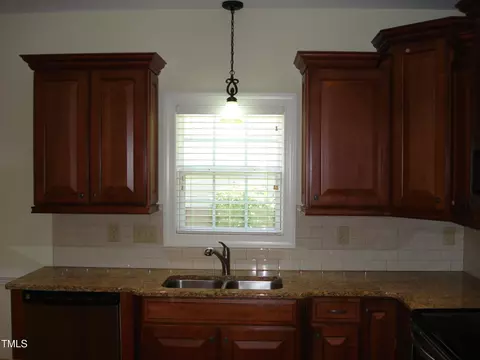 Kitchen - 117 Crescent Dr, Dunn, NC 28334 photo 5 of 8