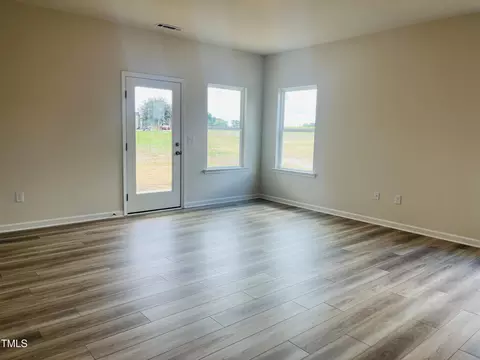 Living - 74 E American Marigold Dr #61, Benson, NC 27504 photo 1 of 2