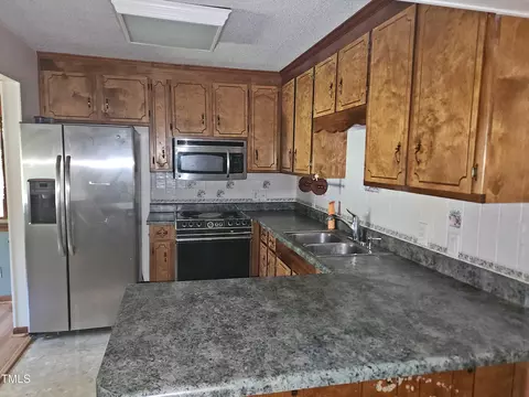 Kitchen - 109 Oak St, Pine Level, NC 27568 photo 3 of 3