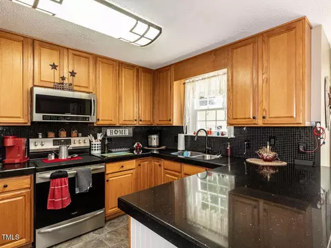Kitchen - 1813 Middle Ridge Dr, Willow Spring, NC 27592 photo 2 of 3