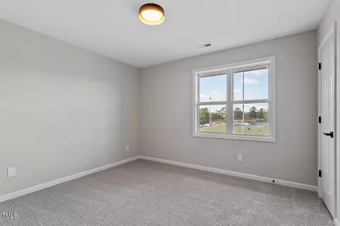 Bedroom - 413 E Williams St, Angier, NC 27501 photo 6 of 9