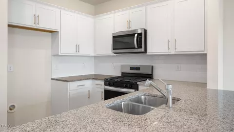 Kitchen - 67 Virgo Dr, Angier, NC 27501 photo 4 of 5