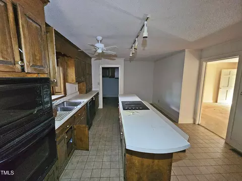 Kitchen - 1602 Wellons Ave, Dunn, NC 28334 photo 8 of 9