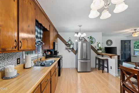 Kitchen - 13808 Labaron Dr, Willow Spring, NC 27592 photo 2 of 2