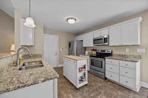 Kitchen - 415 Angus Pl, Stem, NC 27581 photo 7 of 7