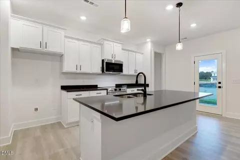 Kitchen - 91 Great Pine Trl, Middlesex, NC 27557 photo 2 of 5