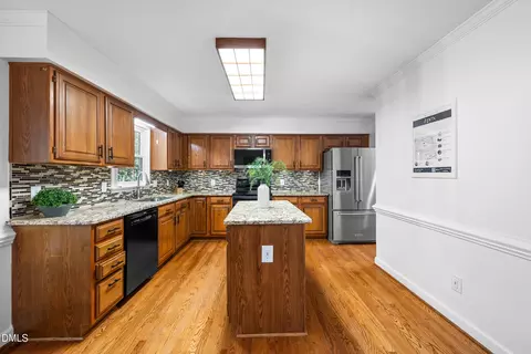 Kitchen - 1002 Eastham Dr, Apex, NC 27502 photo 2 of 5