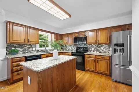 Kitchen - 1002 Eastham Dr, Apex, NC 27502 photo 3 of 5