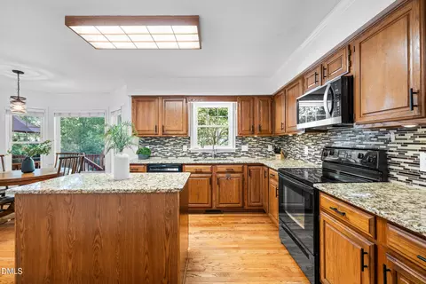 Kitchen - 1002 Eastham Dr, Apex, NC 27502 photo 4 of 5