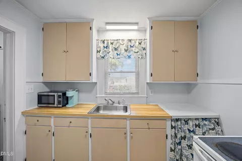 Kitchen - 128 E Moore St, Graham, NC 27253 photo 2 of 3