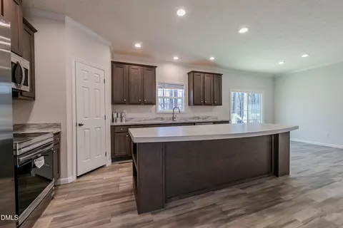 Kitchen - 207 Old Nc 75 S, Stem, NC 27581 photo 2 of 4