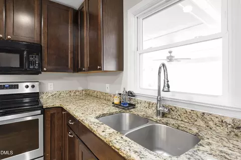 Kitchen - 261 E Lillington St, Angier, NC 27501 photo 5 of 7