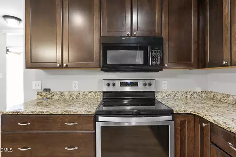 Kitchen - 261 E Lillington St, Angier, NC 27501 photo 7 of 7