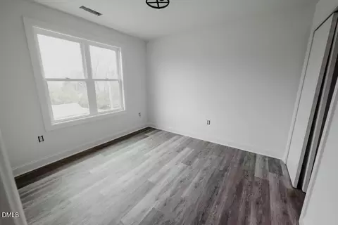 Bedroom - 309 E Perry Ave, Wake Forest, NC 27587 photo 5 of 7