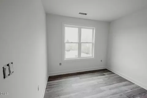 Bedroom - 309 E Perry Ave, Wake Forest, NC 27587 photo 6 of 7