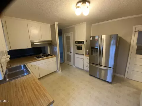 Kitchen - 100 E C St, Erwin, NC 28339 photo 2 of 2