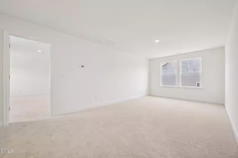 Bedroom - 1069 Channel Drop Loop, Zebulon, NC 27597 photo 4 of 5