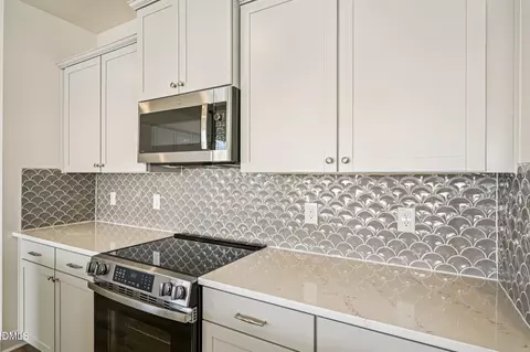 Kitchen - 1069 Channel Drop Loop, Zebulon, NC 27597 photo 4 of 5