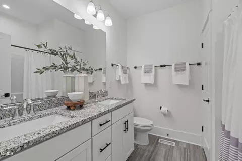 Bath - 7033 Leando Dr, Willow Spring, NC 27592 photo 1 of 4