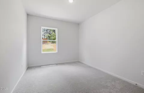 Bedroom - 1148 Lancashire Grove Pl, Willow Spring, NC 27592 photo 4 of 4