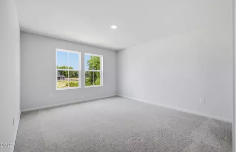 Bedroom - 1148 Lancashire Grove Pl, Willow Spring, NC 27592 photo 2 of 4